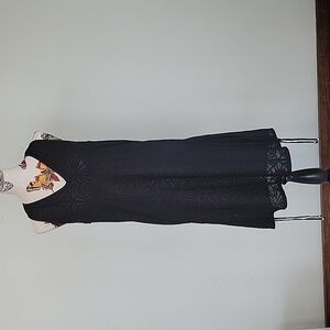 DOTTI black swimsuit cover up.  Adjustable length.  Size is Large.